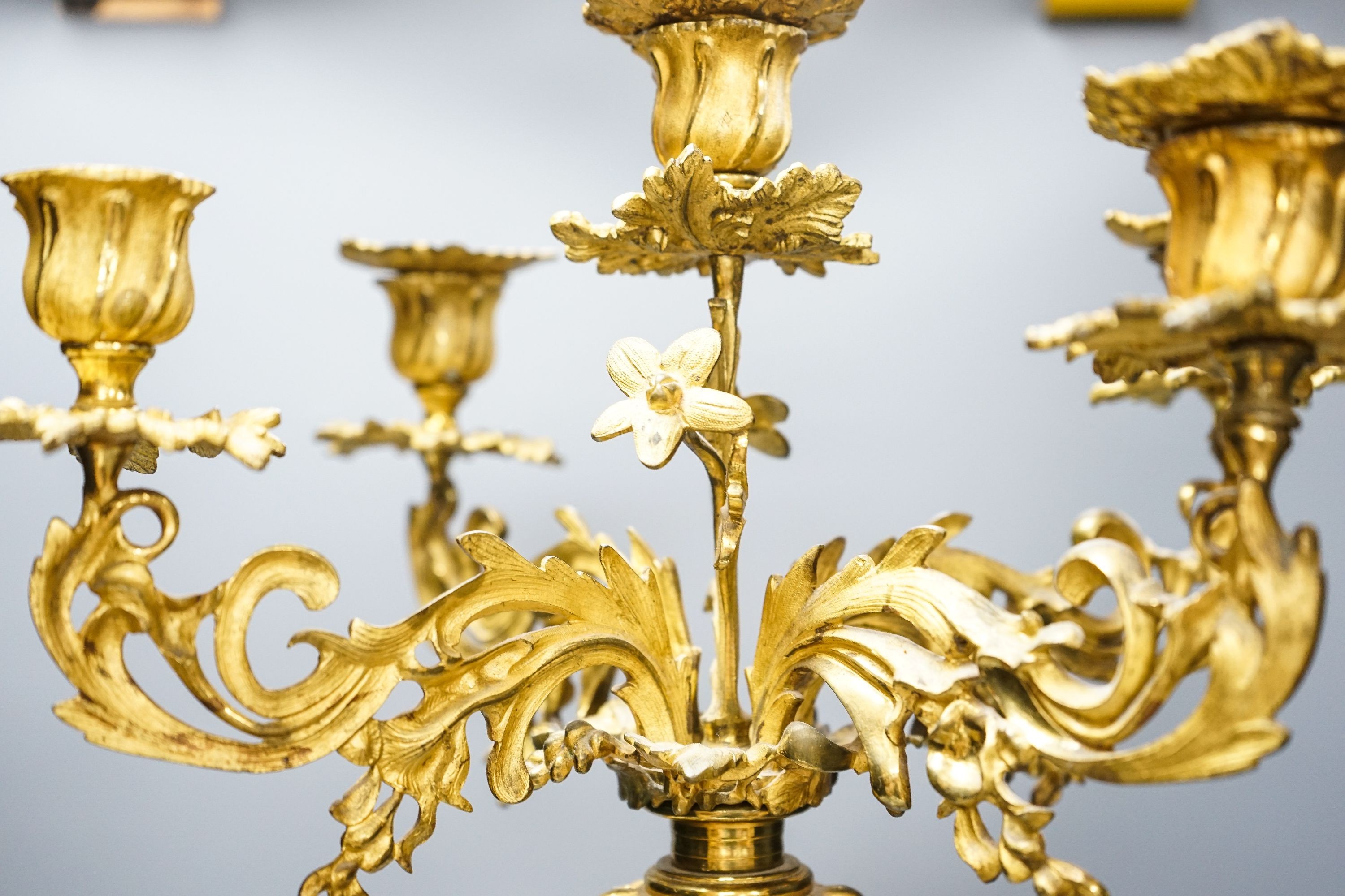 A 19th century ormolu and opaline glass five light candelabrum 63cm